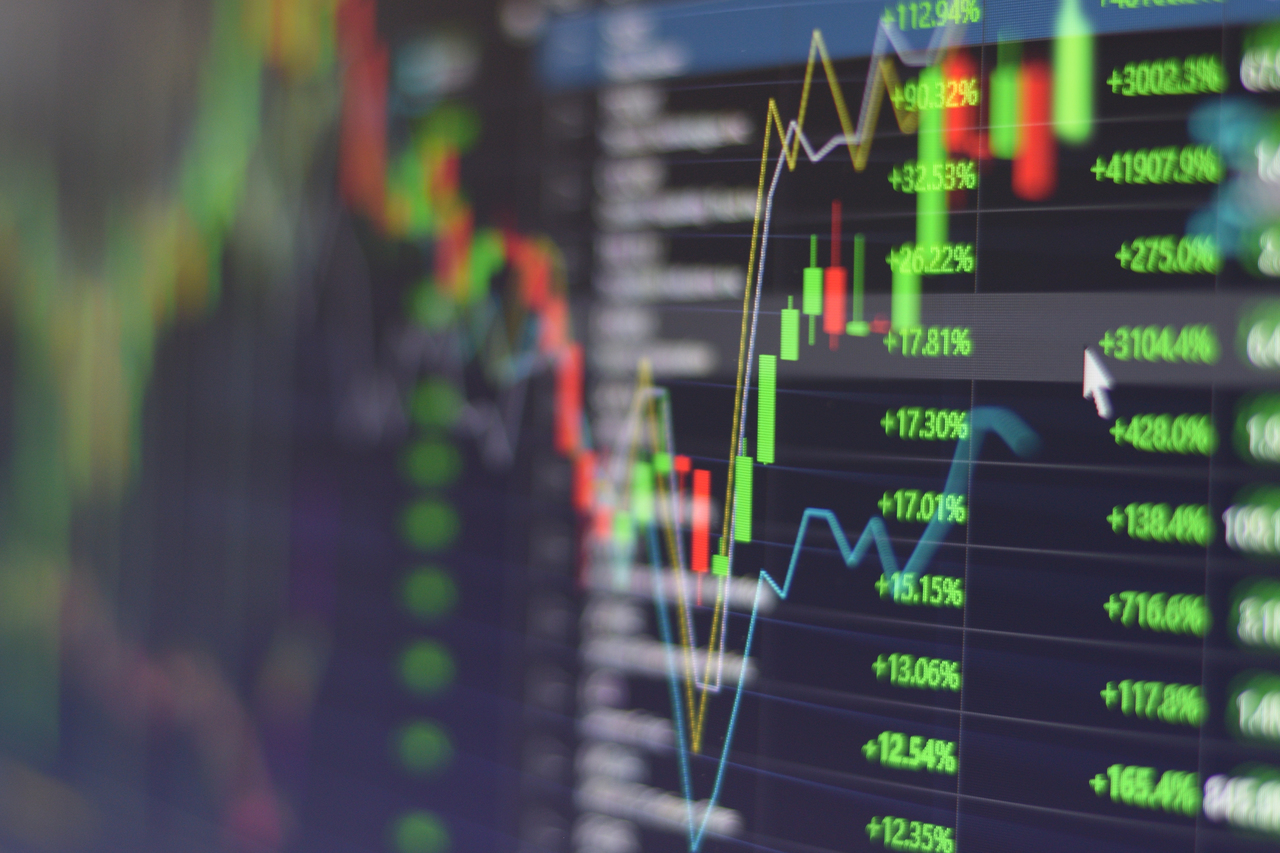 Stock market graph chart with indicator investment trading stock exchange trading market monitor screen close up.