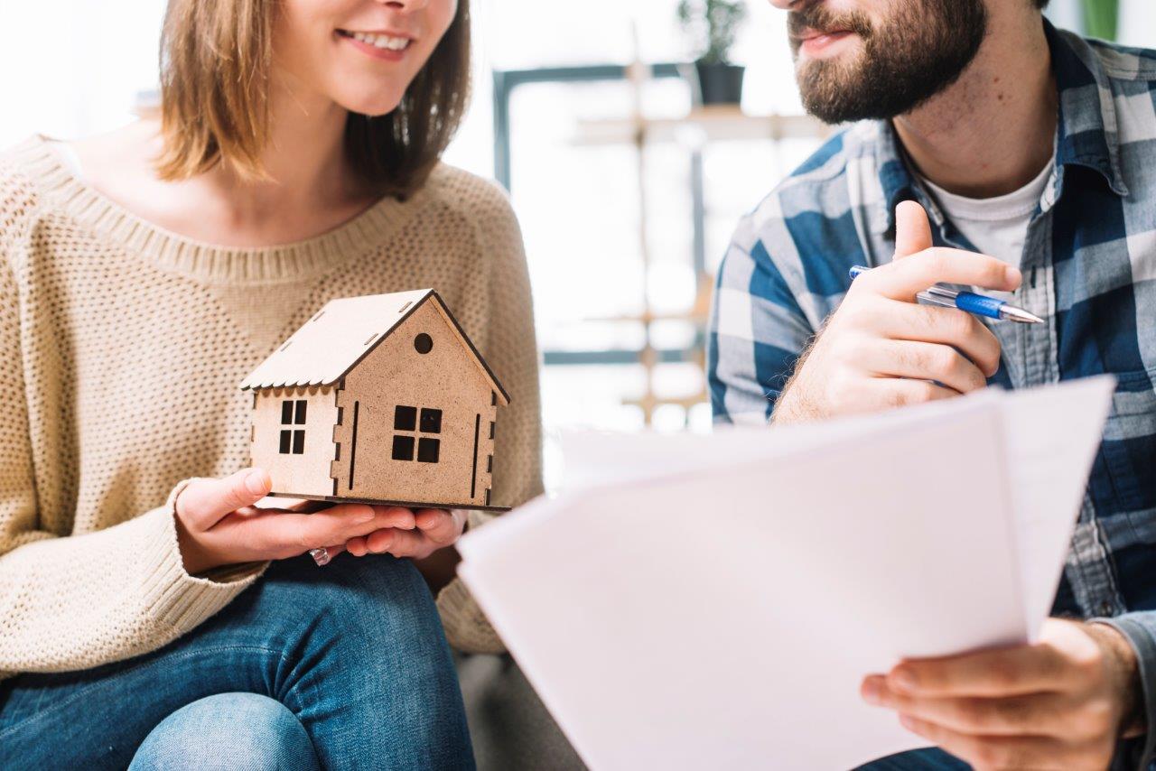 couple going over real estate contract