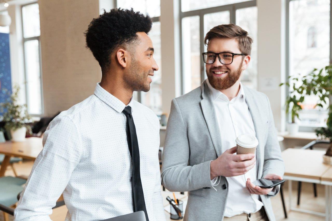 two men talking happily