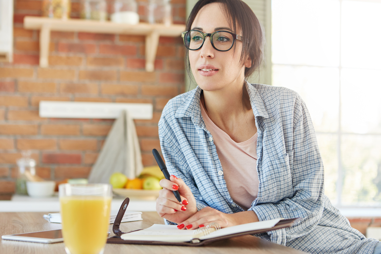 A woman thinking about home remodelling