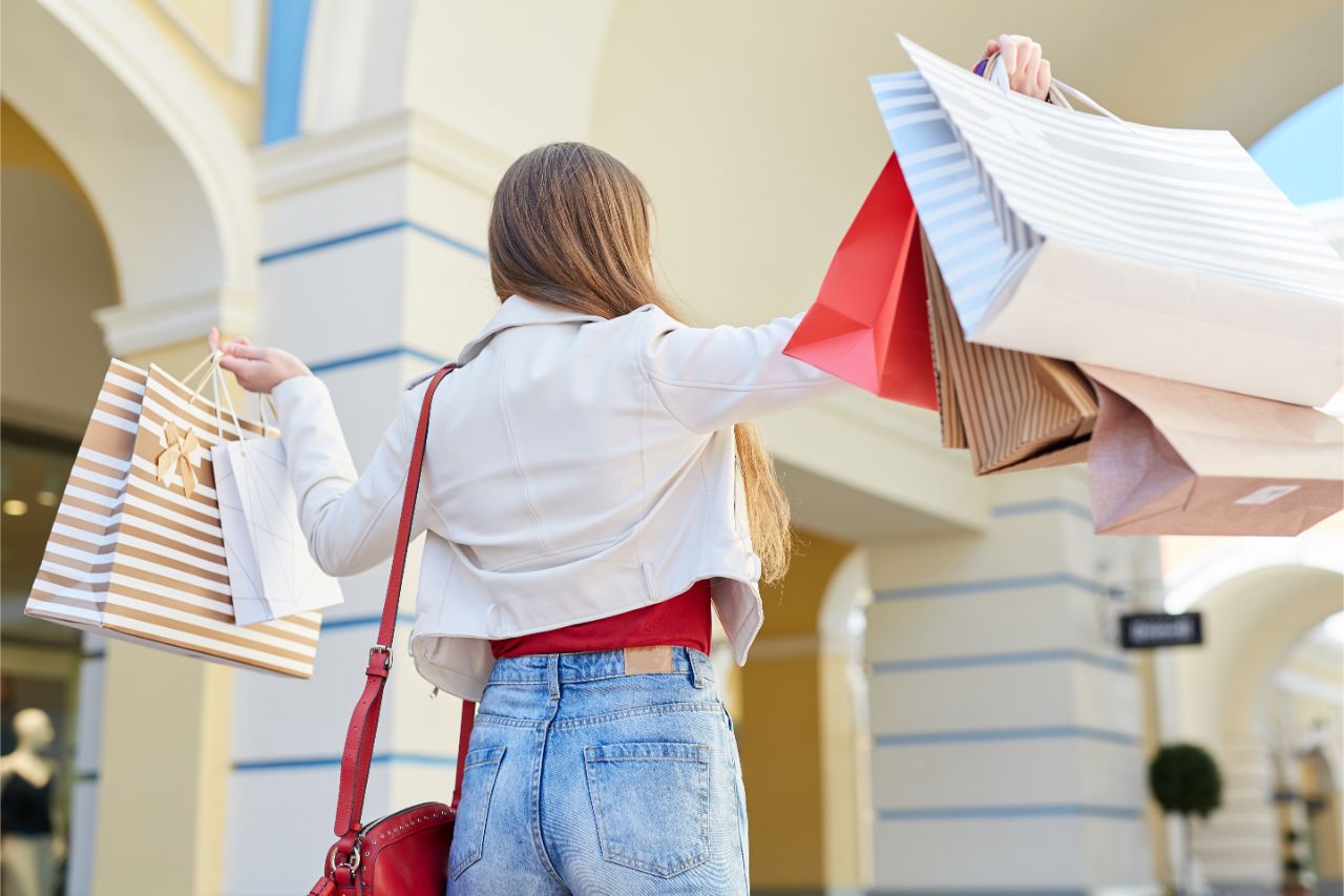 A woman carrying her shopping bags